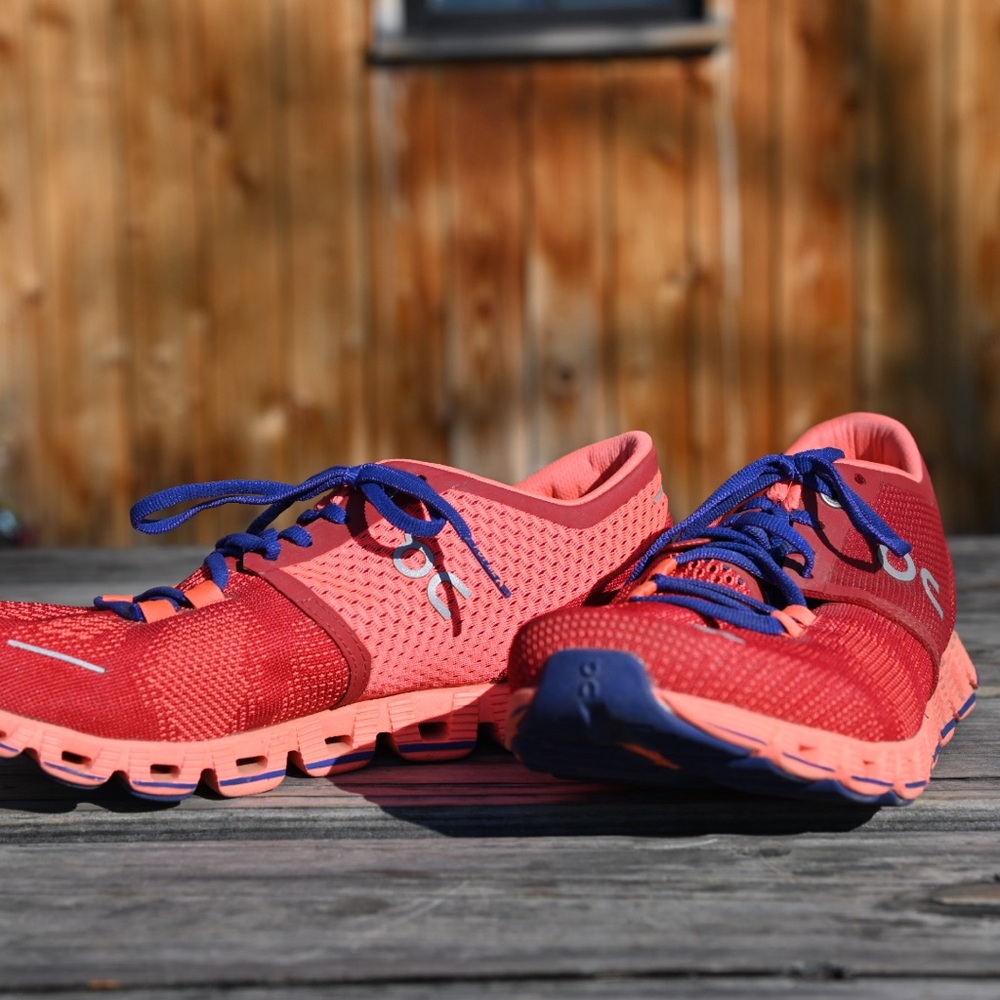 On Running Red and Blue Athletic Shoes with Breathable Mesh